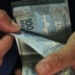 Abono salarial de até R$ 1.621 começa a ser pago nesta sexta